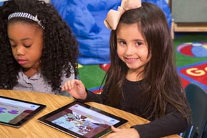 Photo of a girl using Istation on a tablet device.